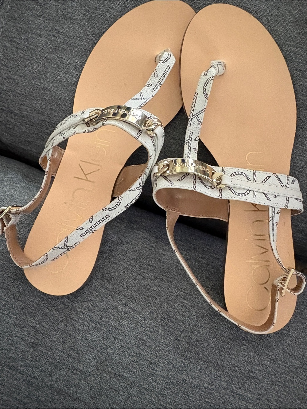 Calvin Klein White Patterned T-Strap Sandals with Gold Accent